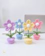 crochet five patel flower pot on deskdecor